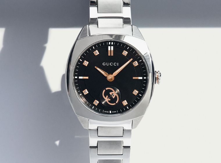 Ladies Gucci Watch with black dial & diamond bezel with steel case 