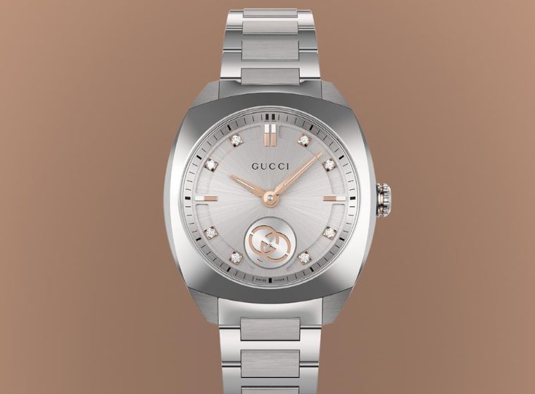 Ladies Gucci Watch with cream dial & diamond bezel with steel case 