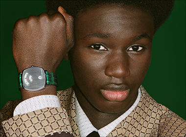 A man wearing a Gucci Watch