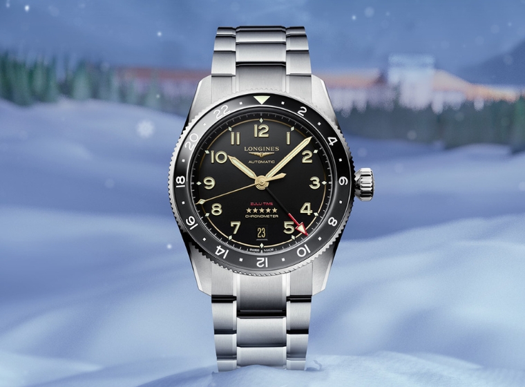 Longines Spirit black dial watch on a snowy backdrop 