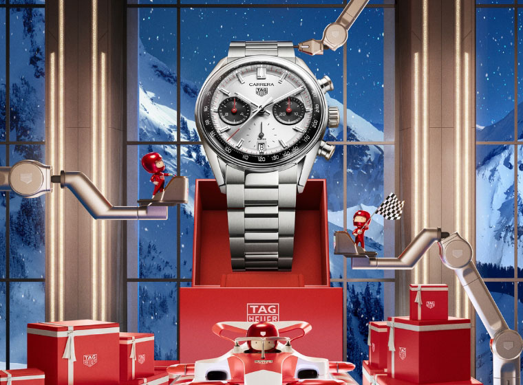 Mens Silver TAG Carrera watch in a festive setting 