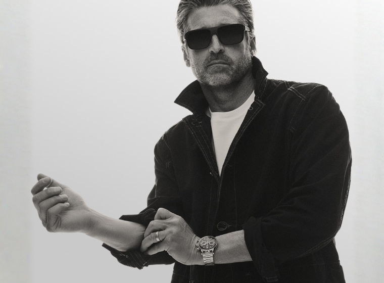 a blue monaco square dial watch on a leather strap