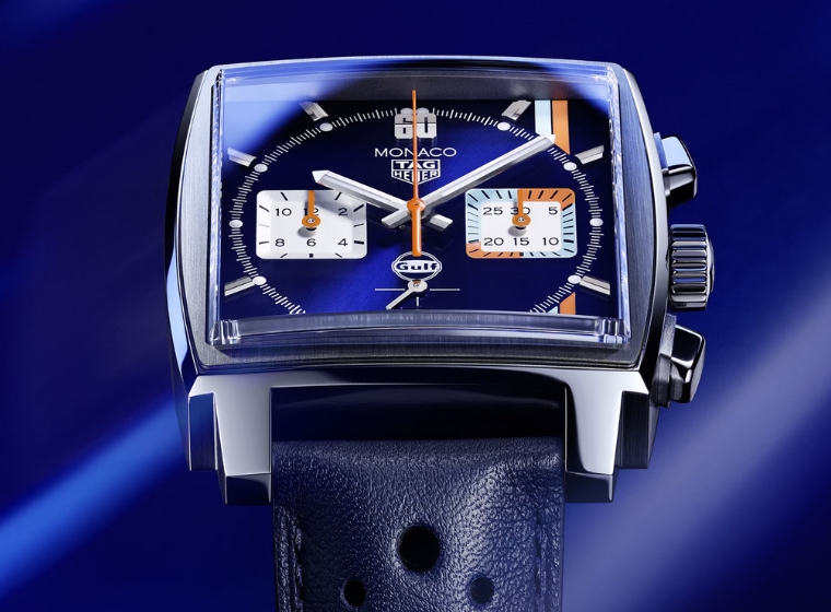 a blue monaco square dial watch on a leather strap