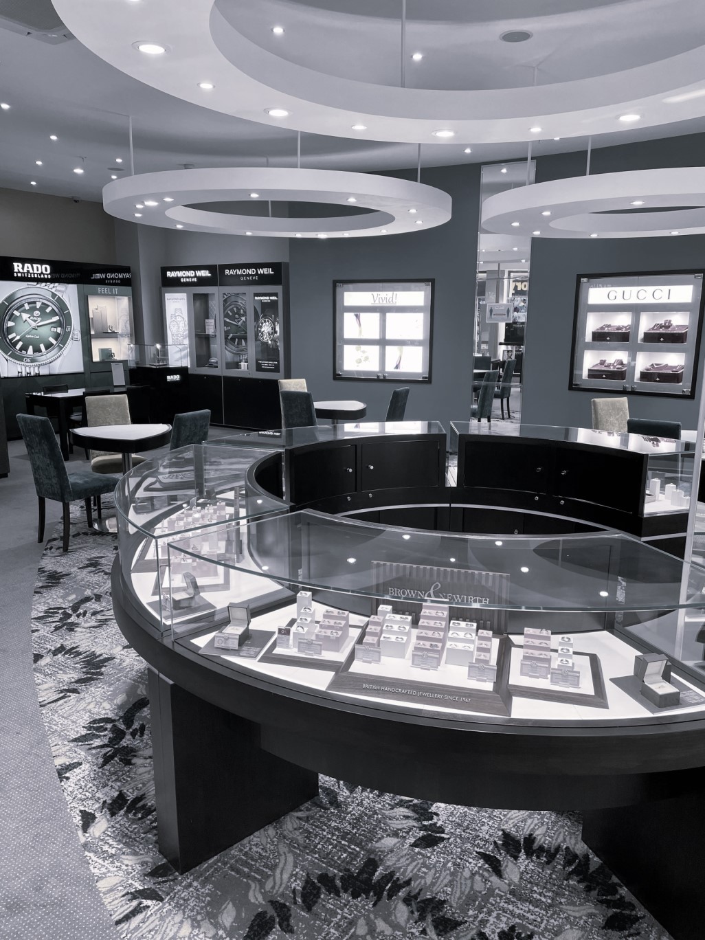 Black and white image of a Peter Jackson showroom counter