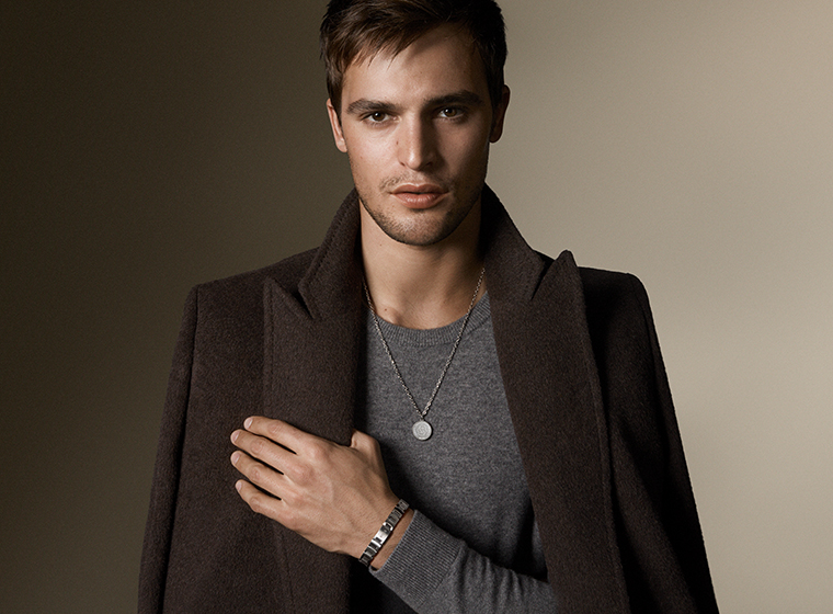 BOSS grey tone necklaces and bracelets being modelled 