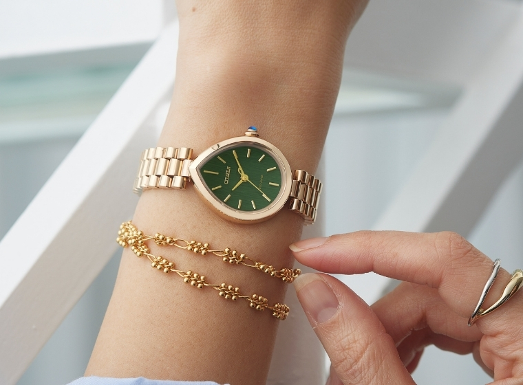 pink citizen watch on a womens arm 