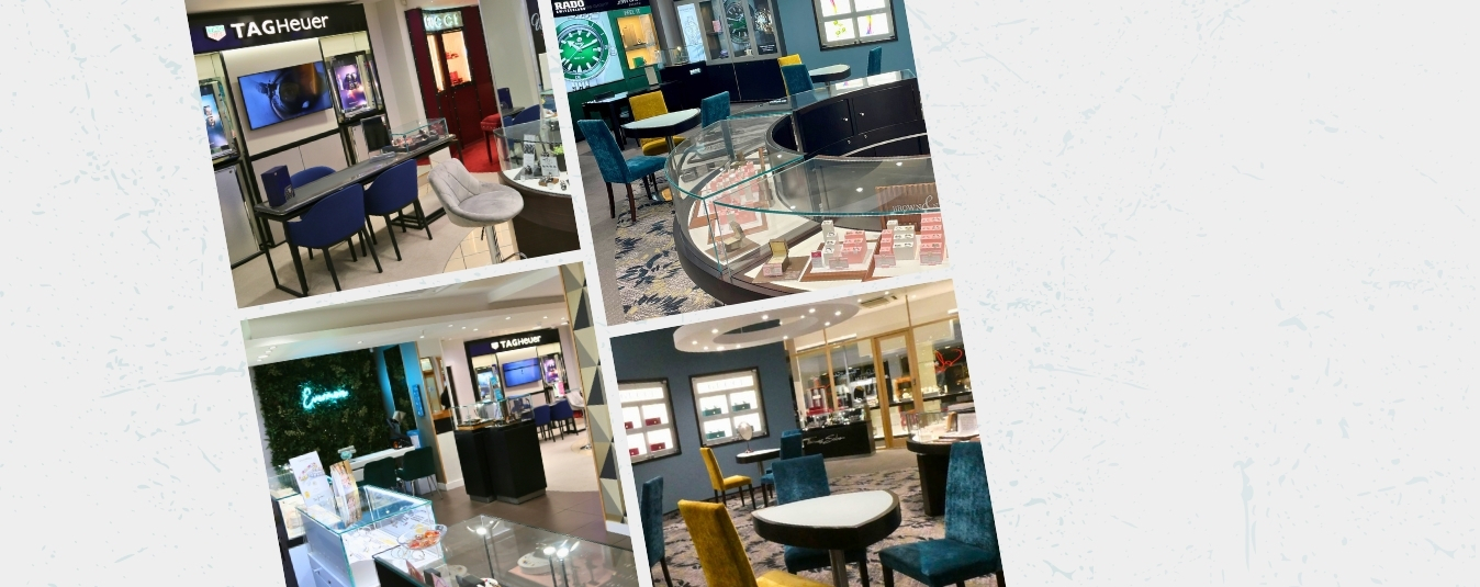 Lady in Christmas jumper sat in front of Christmas tree peeping in gift bag