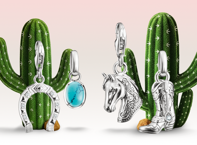 3 women in the background of a thomas Sabo charm bracelet surrounded by a variety of charms 