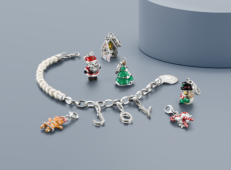 Pearl and Silver Charm bracelet with a variety of Christmas themed charms